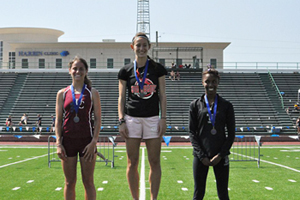 Rio Grande's Cassie Mattia (middle) set a new Mid-South Conference meet record in the 800-meter run