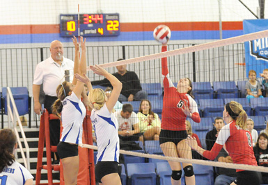 Rio Grande's Ally Hawkins goes airborne for a return during Saturday's MSC Tournament semifinal loss to Lindsey Wilson