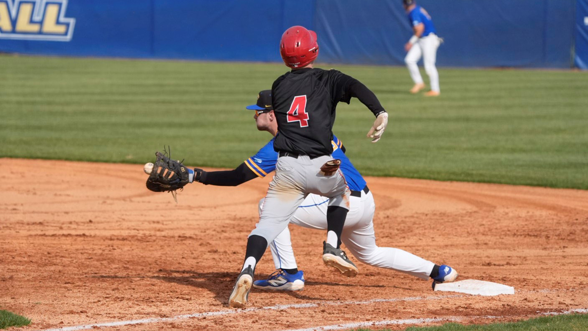 Rio Grande's Brett Haskins tries to beat out an infield grounder during Friday's 5-1 win at Midway University.