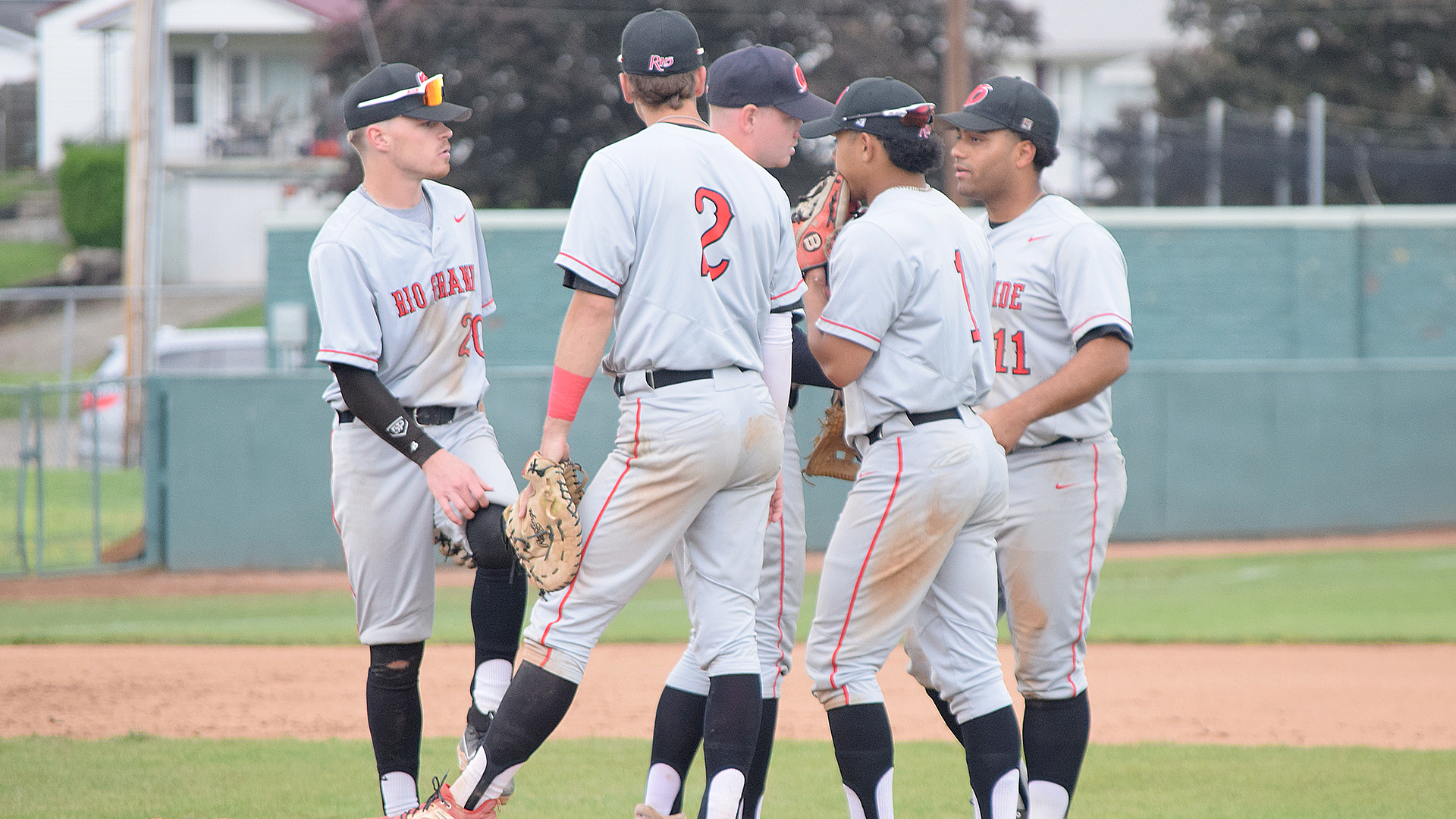 The Rio Grande infield defense gathers on the pitcher's mound during Saturday's game one loss to Shawnee State at Branch Rickey Park in Portsmouth, Ohio.