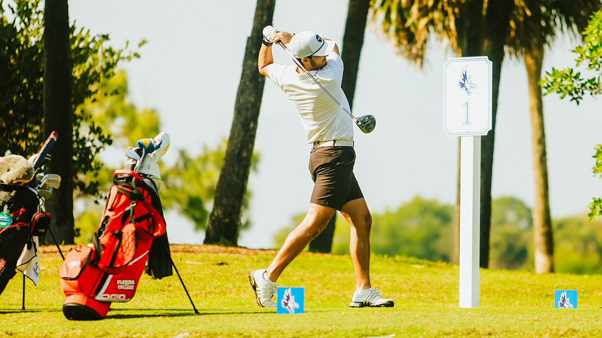 Rio Grande's Jorge Del Solar follows through on a tee shot during action in the Kona Ice Keiser Cup in West Plam Beach, Fla.