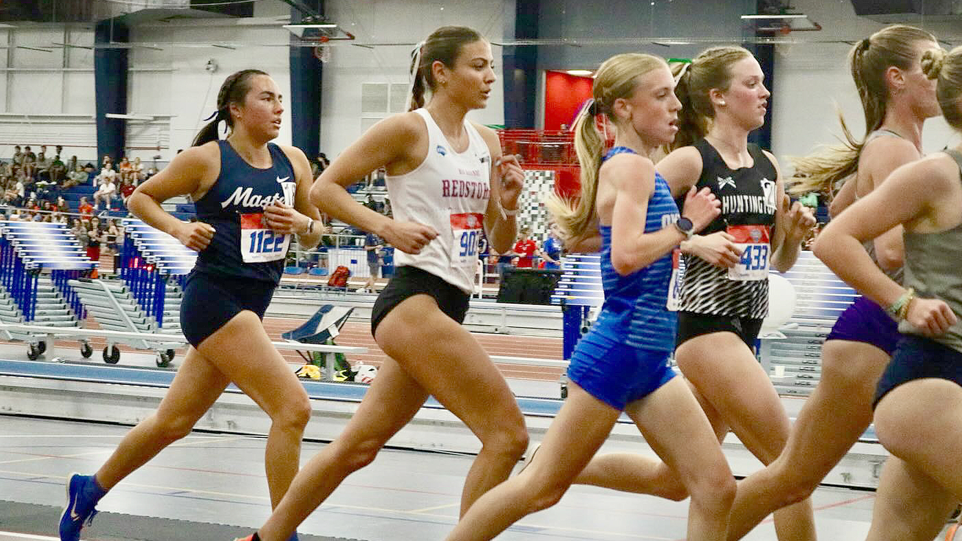 Rio Grande's Amarissa Kerns (white top) earned All-American honors after finishing fourth in the 5,000-meter run during Saturday's action in the NAIA Women's Indoor Track & Field Championships in Gainesville, Fla.