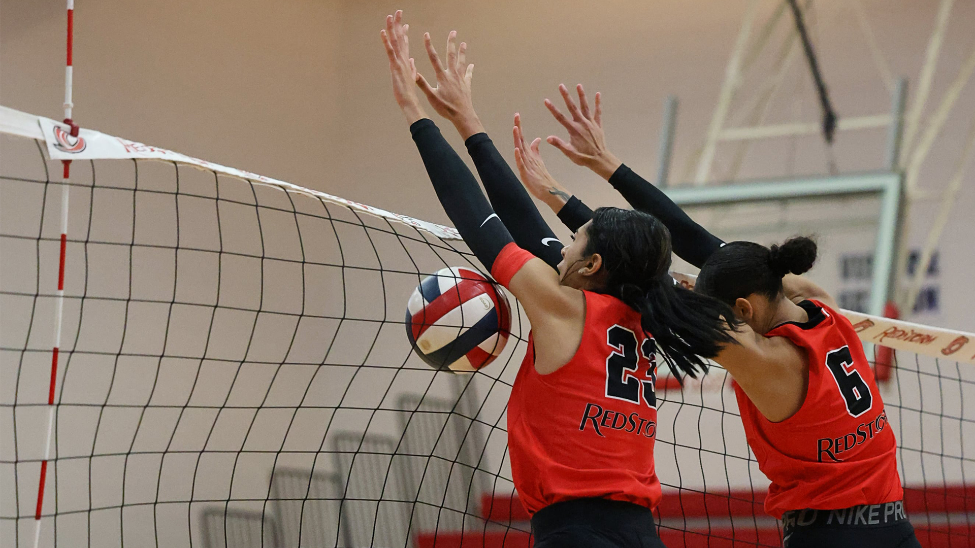 Rio's Katelynn Coey (left) and Jordan Brooks (right) helped the RedStorm post a five-set win over St. Mary-of-the-Woods College on Saturday.